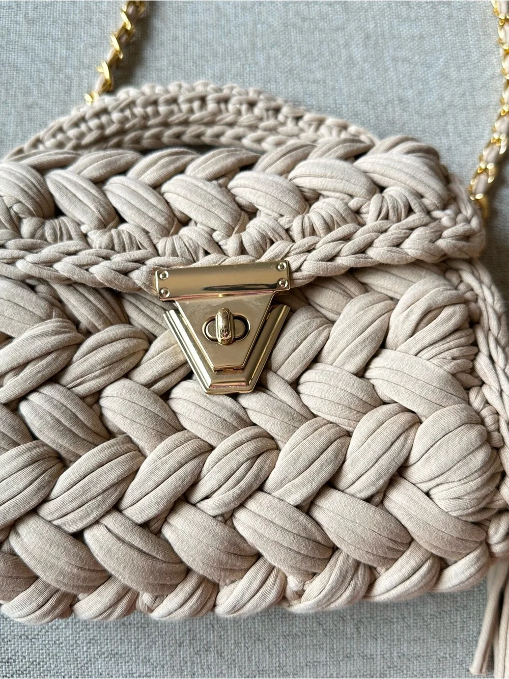 Handwoven Tan Fabric Crossbody Bag with Top Handle and Gold Chain Gold Accents